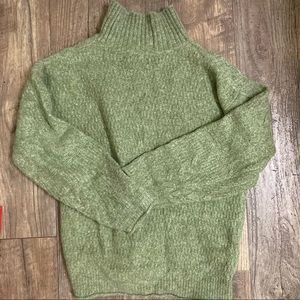 Soft green turtleneck sweater